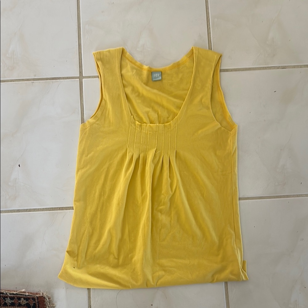 Yellow top bought on a trip to argentina from ver